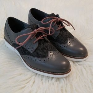 Cole Haan wing tip lace ups